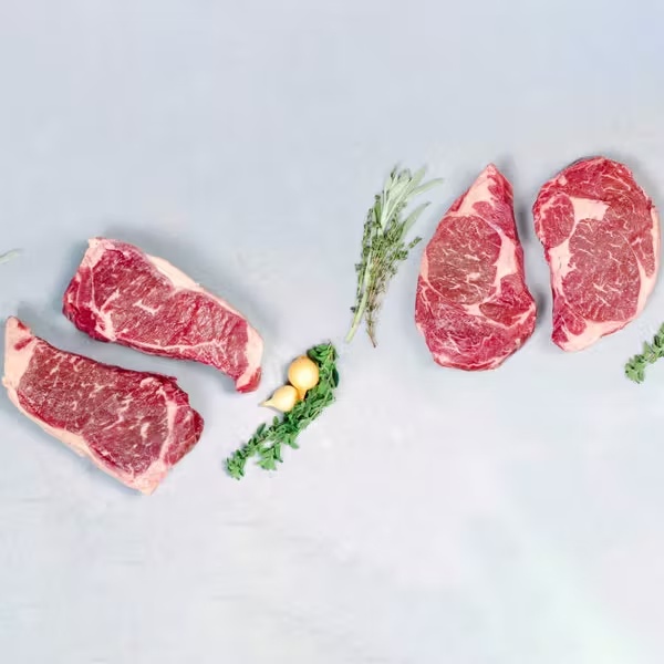Akaushi Wagyu Boneless Ribeyes + NY Strip Steaks