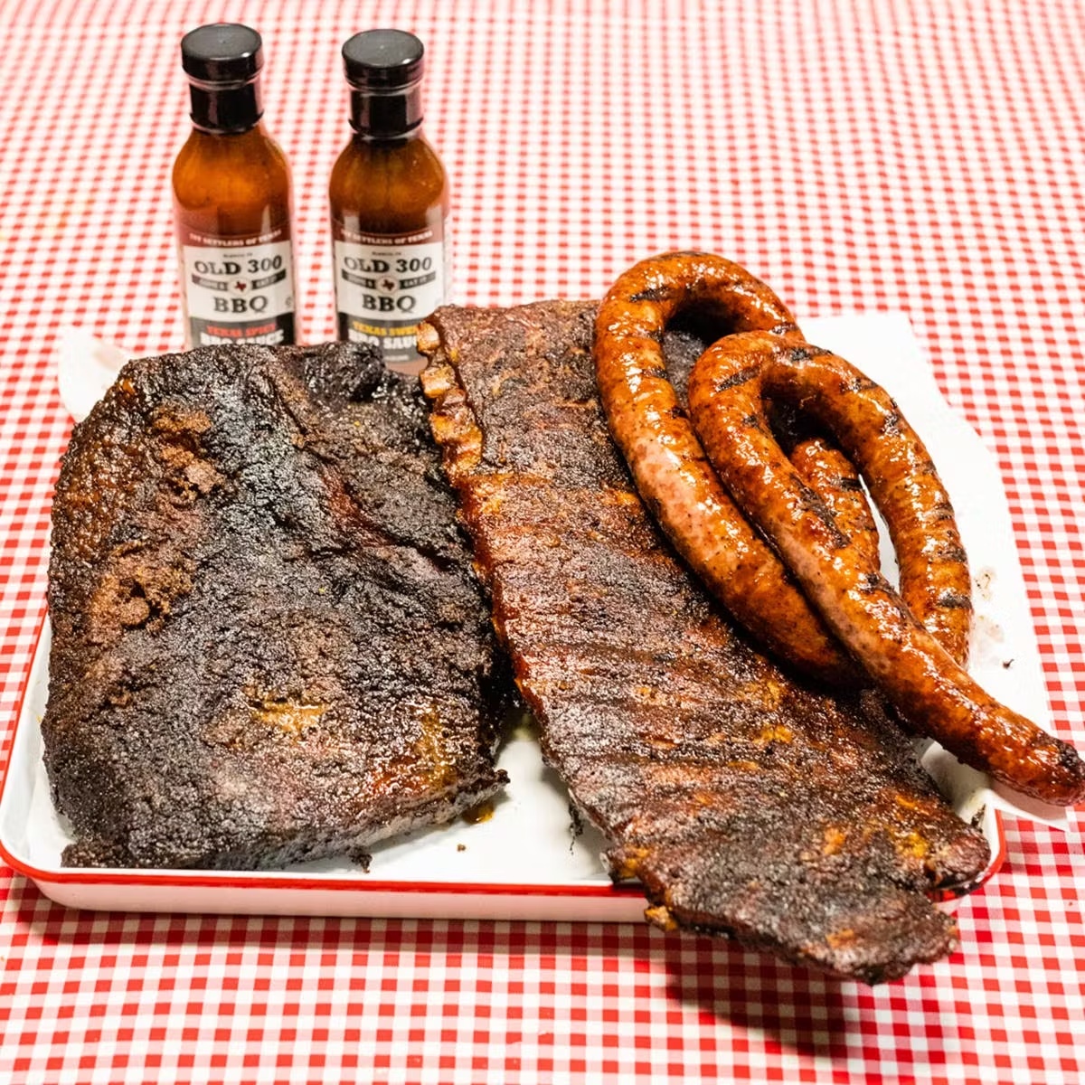 Texas Smoked Brisket, Ribs, and Sausages Trio