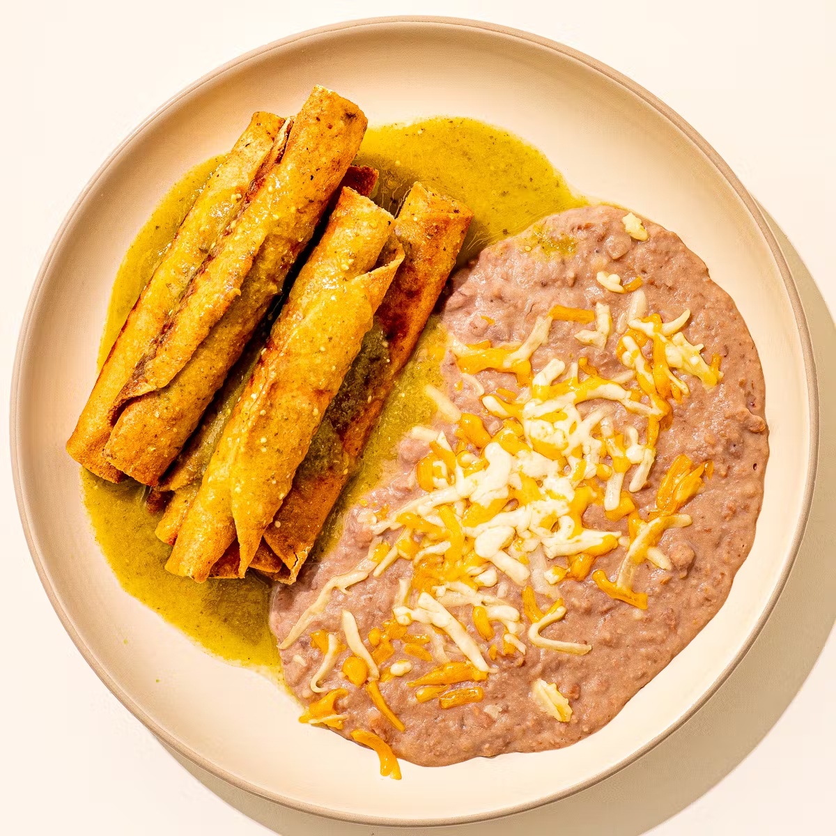 Beef Taquitos + Refried Beans