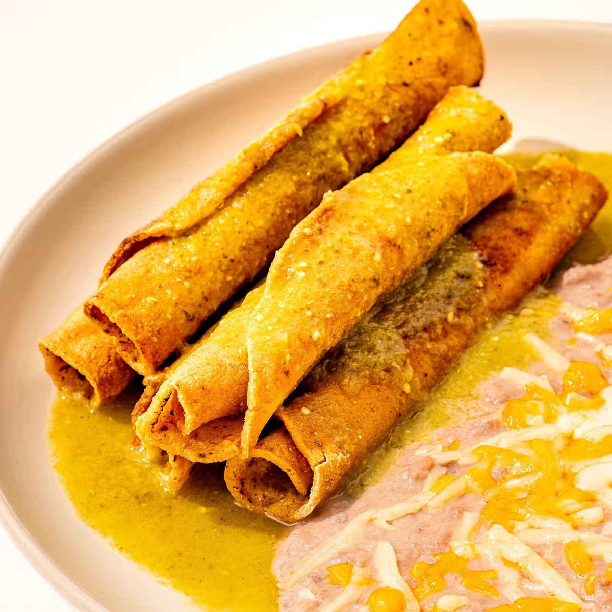 Beef Taquitos + Refried Beans